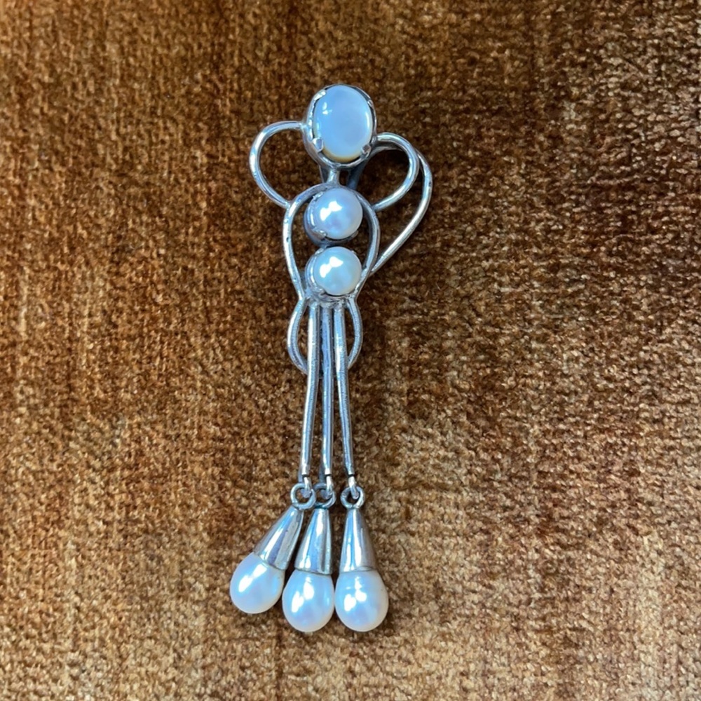 Handcrafted silver pendant.